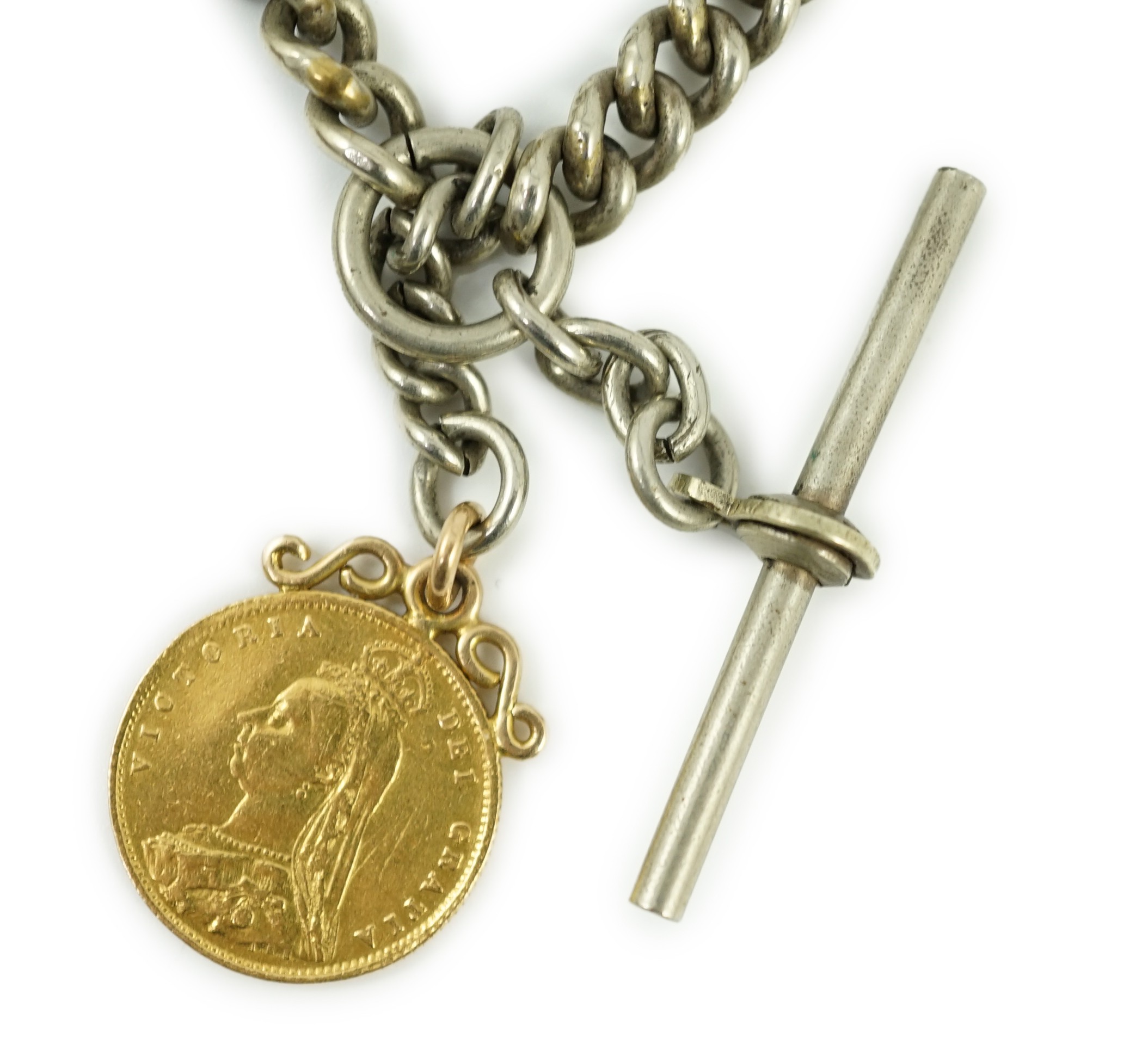 A Victorian 1887 gold half sovereign, on pendant mount and hung from a white metal albert.